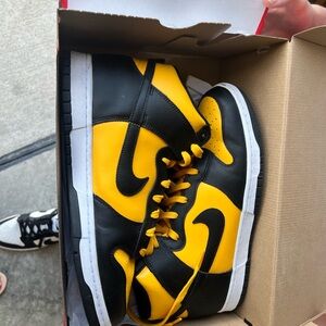 Size 13 black and yellow Nike Dunk Hi Retro